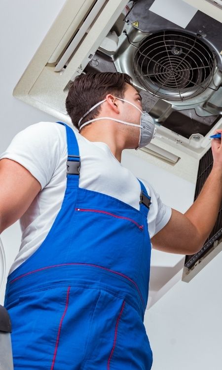 worker-fixing-hvac-oxford-ms